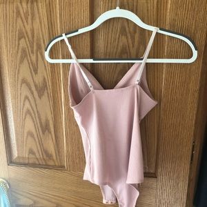 Pink bodysuit